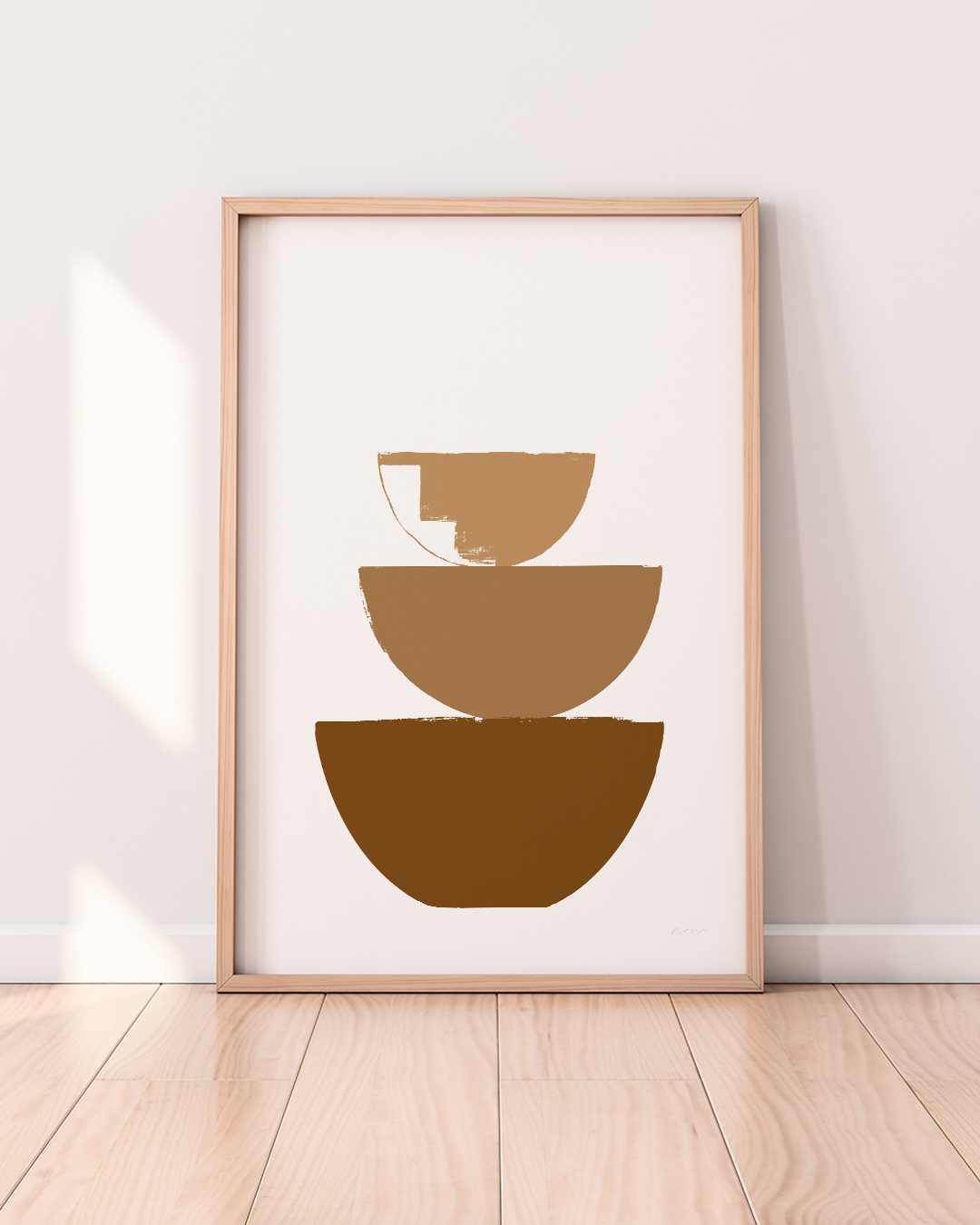 Earthy-toned Bowls Art Print framed and styled on a warm wood floor